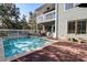 Great backyard pool with a view of the upper deck, green siding, and trees, ideal for outdoor enjoyment at 8 Fairway Oaks Ln, Isle of Palms, SC 29451
