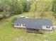 Aerial view of the house, with the backyard, pool and shed, and a spacious deck for outdoor enjoyment at 8072 Bing Hill Road Rd, Adams Run, SC 29426
