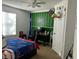 Bedroom with football themed accent wall, and a desk for work or study at 8072 Bing Hill Road Rd, Adams Run, SC 29426