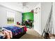 Bedroom featuring a sports mural wall, an open window, and fishing poles at 8072 Bing Hill Road Rd, Adams Run, SC 29426