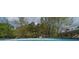 Backyard pool with surrounding greenery, offering a refreshing and relaxing outdoor space for leisure and recreation at 8072 Bing Hill Road Rd, Adams Run, SC 29426