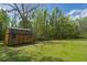 A backyard shed, which provides additional storage space and enhances the property's functionality at 8072 Bing Hill Road Rd, Adams Run, SC 29426