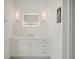 Bright bathroom with a white vanity, modern lighting, and a large mirror at 821 Bulls Bay Blvd, Mount Pleasant, SC 29429