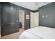 Gray bedroom with walk-in closet and en-suite bathroom at 821 Bulls Bay Blvd, Mount Pleasant, SC 29429