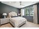 Neutral bedroom featuring plush carpet, gray walls, and a beautiful lake view from the window at 821 Bulls Bay Blvd, Mount Pleasant, SC 29429