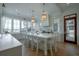 Elegant kitchen with a large island, seating for six, and bright natural light at 821 Bulls Bay Blvd, Mount Pleasant, SC 29429