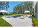 Resort-style pool area with surrounding lounge chairs and umbrellas, perfect for relaxation and entertainment at 821 Bulls Bay Blvd, Mount Pleasant, SC 29429