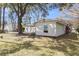 Spacious backyard featuring mature trees providing ample shade to the property at 834 Prince John Dr, Charleston, SC 29407