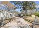 View of the backyard and exterior of the property showing the driveway at 834 Prince John Dr, Charleston, SC 29407