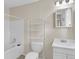 Bathroom with white fixtures including a tub shower, toilet, and vanity at 834 Prince John Dr, Charleston, SC 29407