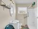 Modest bathroom featuring a tub shower with a white vanity and oval mirror at 834 Prince John Dr, Charleston, SC 29407
