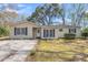 Charming single-story home featuring a well-maintained yard and traditional architecture at 834 Prince John Dr, Charleston, SC 29407