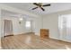 Neutral living room with luxury vinyl plank flooring and a ceiling fan at 834 Prince John Dr, Charleston, SC 29407
