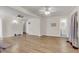 Spacious living room with luxury vinyl plank flooring, ceiling fans, and natural light at 834 Prince John Dr, Charleston, SC 29407