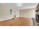 Hardwood floor living room featuring an open doorway and natural light at 834 Prince John Dr, Charleston, SC 29407