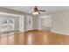 Bright and airy living room with hardwood floors and a decorative front door at 834 Prince John Dr, Charleston, SC 29407