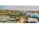 Gorgeous aerial view of a coastal community with access to tennis courts, beaches, and luxury accommodations at 94 Seaside Cottage Ln, Isle of Palms, SC 29451