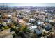 Scenic aerial shot of homes in a cozy neighborhood near the city and harbor, with bridges in the distance at 318 Sumter St, Charleston, SC 29403