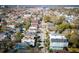 Aerial view of a neighborhood featuring a mix of colorful houses and tree-lined streets at 318 Sumter St, Charleston, SC 29403