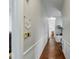Bright hallway with hardwood floors leading to various rooms at 318 Sumter St, Charleston, SC 29403