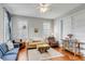 Bright living room featuring stylish decor, hardwood floors, and ample natural light at 318 Sumter St, Charleston, SC 29403