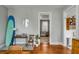 Bright and inviting living room with hardwood floors and doorway to another room at 318 Sumter St, Charleston, SC 29403