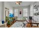 Versatile office space with hardwood floors, natural light, and multiple desks at 318 Sumter St, Charleston, SC 29403