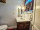 Bathroom features a single vanity with wood accents at 1003 Wichman St, Walterboro, SC 29488