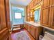 This bathroom features a classic vanity and tub, creating a cozy, functional space at 1003 Wichman St, Walterboro, SC 29488
