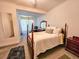 This bright bedroom features a queen size bed, a nice dresser, night stand and comfortable accents at 1003 Wichman St, Walterboro, SC 29488