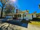 Side view of home with covered parking, generator, and lovely yard at 1003 Wichman St, Walterboro, SC 29488