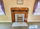 This living area showcases a charming fireplace that adds warmth and character at 1003 Wichman St, Walterboro, SC 29488