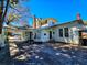 A spacious house with a connected covered garage and a well-maintained outdoor area at 1003 Wichman St, Walterboro, SC 29488