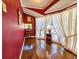 Charming sitting room with hardwood floors, bright windows and lots of natural light at 1003 Wichman St, Walterboro, SC 29488