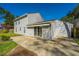The home's backyard also includes a concrete patio area extending from the back door at 102 Challis Ct, Goose Creek, SC 29445
