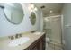 Bathroom featuring double vanity, granite countertops, and glass shower doors at 102 Challis Ct, Goose Creek, SC 29445