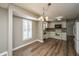 Eat-in kitchen features new appliances, white cabinets and an adjacent dining area at 102 Challis Ct, Goose Creek, SC 29445