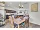 Open-concept living space connecting the kitchen, dining area, and living room with modern finishes at 1032 Berry Patch Cir, Summerville, SC 29485