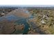 Magnificent aerial view of winding river ways through the community, docks, and marsh views at 1054 Anna Knapp Blvd # 4E, Mount Pleasant, SC 29464