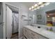 Well-lit bathroom with a double vanity, marble countertop, and modern fixtures at 1054 Anna Knapp Blvd # 4E, Mount Pleasant, SC 29464