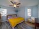 Calming bedroom with two large windows, wood floors, and neutral walls, creating a peaceful retreat at 1054 Anna Knapp Blvd # 4E, Mount Pleasant, SC 29464