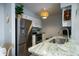 Modern kitchen boasts stainless steel appliances, granite counters, and ample cabinet space at 1054 Anna Knapp Blvd # 4E, Mount Pleasant, SC 29464
