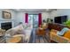 Comfortable living room features a fireplace, modern decor, and access to outdoor space at 1054 Anna Knapp Blvd # 4E, Mount Pleasant, SC 29464