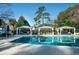 Community pool featuring cabanas and lounge seating at 1054 Anna Knapp Blvd # 4E, Mount Pleasant, SC 29464