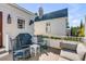 Cozy balcony featuring seating, planters, and a grill with a view of the surrounding neighborhood at 106 Queen St # B, Charleston, SC 29401