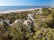 Beautiful beachside condos nestled amongst lush trees, offering stunning ocean views at 1109 Diodia Ct, Kiawah Island, SC 29455