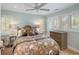Comfortable bedroom with lots of natural light, a ceiling fan, and neutral tones at 1109 Diodia Ct, Kiawah Island, SC 29455