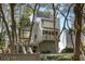 Attractive beach home with stairs and trees, offering a blend of coastal and natural beauty at 1109 Diodia Ct, Kiawah Island, SC 29455