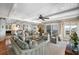 Open-concept living room with comfortable seating, beach views, and hardwood floors, perfect for relaxing and entertaining at 1109 Diodia Ct, Kiawah Island, SC 29455