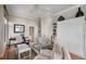 Bright living room with a sofa, workspace, and built-in cabinets at 1109 Diodia Ct, Kiawah Island, SC 29455